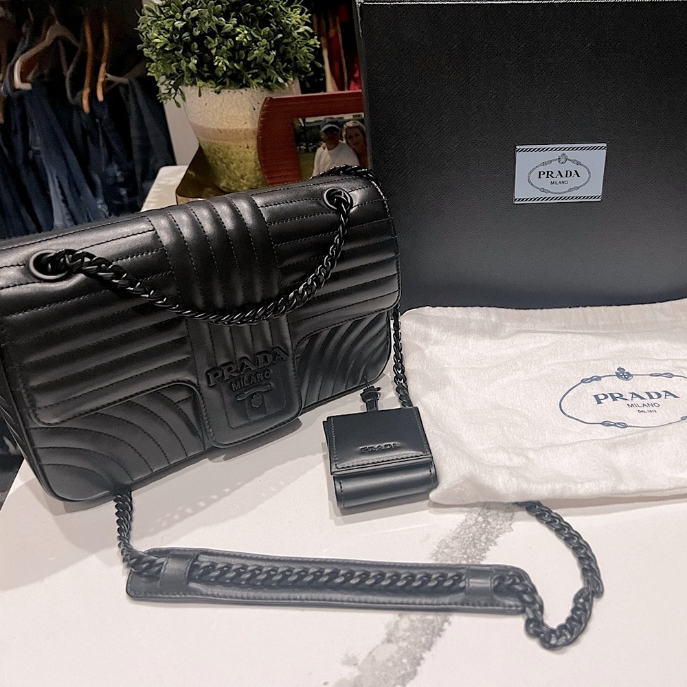 Immaculate Prada Diagramme convertible crossbody shoulder black on black.